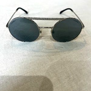 CHANEL
Interlocking CC Logo Round Sunglasses